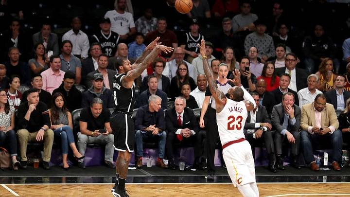 NEW YORK, NY - OCTOBER 25: Sean Kilpatrick #6 of the Brooklyn Nets takes a shot against LeBron James #23 of the Cleveland Cavaliers in the first quarter during their game at Barclays Center on October 25, 2017 in the Brooklyn Borough of New York City. NOTE TO USER: User expressly acknowledges and agrees that, by downloading and or using this photograph, User is consenting to the terms and conditions of the Getty Images License Agreement. (Photo by Abbie Parr/Getty Images)