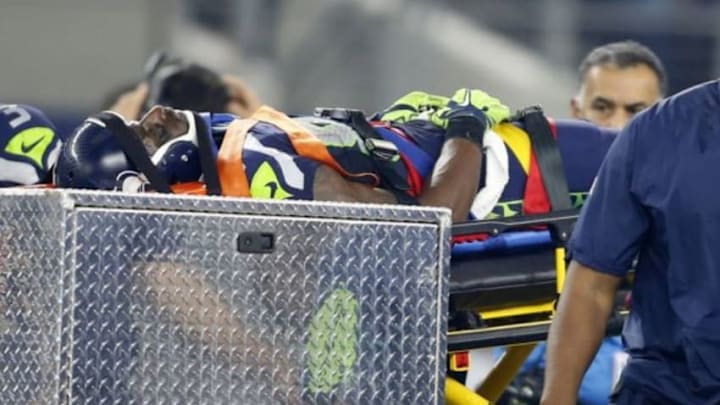 Nov 1, 2015; Arlington, TX, USA; Seattle Seahawks wide receiver Ricardo Lockette (83) is carted off the field after being injured in the second quarter against the Dallas Cowboys at AT&T Stadium. Mandatory Credit: Tim Heitman-USA TODAY Sports