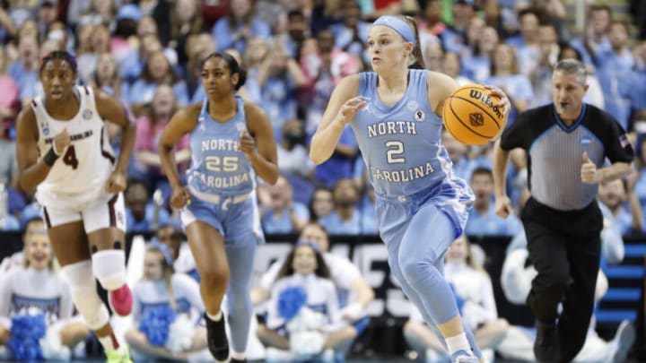 GREENSBORO, NORTH CAROLINA - MARCH 25: Carlie Littlefield #2 of the North Carolina Tar Heels dribbles during the first half against the South Carolina Gamecocks in the NCAA Women's Basketball Tournament Sweet 16 Round at Greensboro Coliseum Complex on March 25, 2022 in Greensboro, North Carolina. (Photo by Sarah Stier/Getty Images)