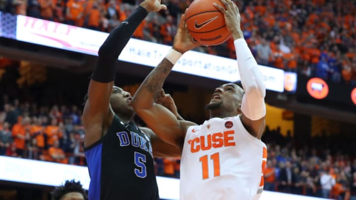 SYRACUSE, NY - FEBRUARY 23: Oshae Brissett #11 of the Syracuse Orange shoots the ball against the defense of RJ Barrett #5 of the Duke Blue Devils during the second half at the Carrier Dome on February 23, 2019 in Syracuse, New York. Duke defeated Syracuse 75-65. (Photo by Rich Barnes/Getty Images)
