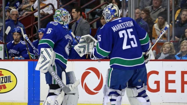 VANCOUVER, BC - MARCH 9: Thatcher Demko #35 of the Vancouver Canucks is switch out with teammate Jacob Markstrom #25 during their NHL game against the Vegas Golden Knights at Rogers Arena March 9, 2019 in Vancouver, British Columbia, Canada. (Photo by Jeff Vinnick/NHLI via Getty Images)