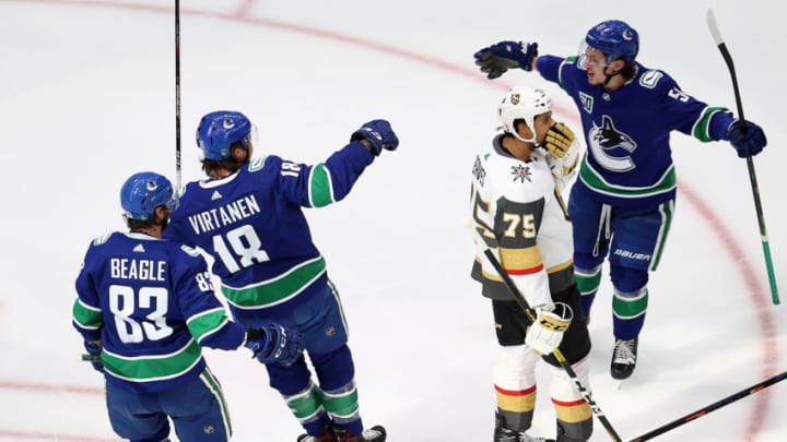 EDMONTON, ALBERTA - SEPTEMBER 03: Jake Virtanen #18 of the Vancouver Canucks is congratulated by his teammates after scoring a goal against the Vegas Golden Knights in Game Six of the Western Conference Second Round during the 2020 NHL Stanley Cup Playoffs at Rogers Place on September 03, 2020 in Edmonton, Alberta, Canada. (Photo by Bruce Bennett/Getty Images)