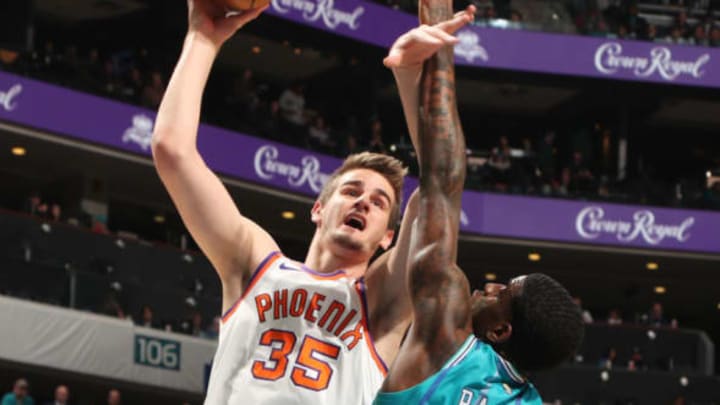 CHARLOTTE, NC – MARCH 10: Dragan Bender #35 of the Phoenix Suns drives to the basket during the game against the Charlotte Hornets on March 10, 2018 at Spectrum Center in Charlotte, North Carolina. NOTE TO USER: User expressly acknowledges and agrees that, by downloading and or using this photograph, User is consenting to the terms and conditions of the Getty Images License Agreement. Mandatory Copyright Notice: Copyright 2018 NBAE (Photo by Kent Smith/NBAE via Getty Images)