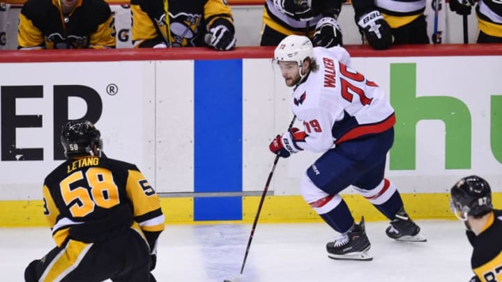 PITTSBURGH, PA - MAY 07: Washington Capitals Left Wing Nathan Walker (79) skates with the puck while Pittsburgh Penguins defenseman Kris Letang (58) defends during the third period. The Washington Capitals went on win 2-1 in the overtime period against the Pittsburgh Penguins in Game Six of the Eastern Conference Second Round during the 2018 NHL Stanley Cup Playoffs on May 7, 2018, at PPG Paints Arena in Pittsburgh, PA. The Capitals won the series 4-2 and advance to the Eastern Conference Final. (Photo by Jeanine Leech/Icon Sportswire via Getty Images)