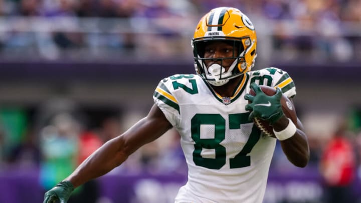 MINNEAPOLIS, MN - SEPTEMBER 11: Romeo Doubs #87 of the Green Bay Packers runs with the ball against the Minnesota Vikings in the third quarter of the game at U.S. Bank Stadium on September 11, 2022 in Minneapolis, Minnesota. The Vikings defeated the Packers 23-7. (Photo by David Berding/Getty Images)