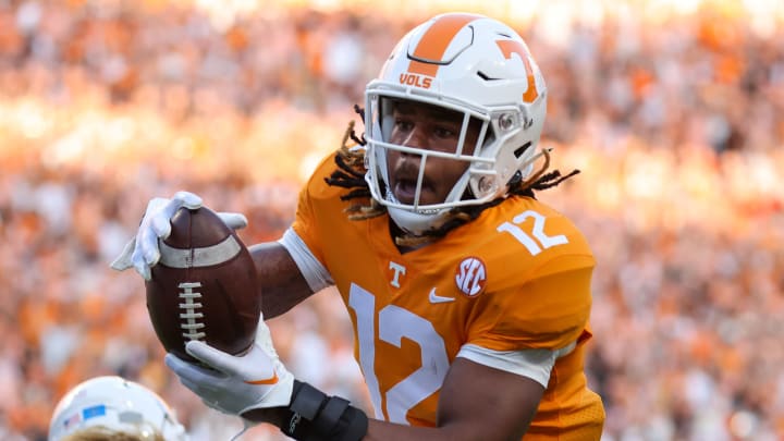 Sep 1, 2022; Knoxville, Tennessee, USA; Tennessee Volunteers defensive back Tamarion McDonald (12) intercepts the ball against the Ball State Cardinals during the first quarter at Neyland Stadium. Mandatory Credit: Randy Sartin-USA TODAY Sports