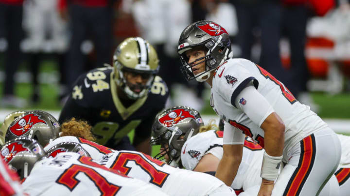 Sep 13, 2020; New Orleans, Louisiana, USA; Tampa Bay Buccaneers quarterback Tom Brady (12) under center against the New Orleans Saints during the first quarter at the Mercedes-Benz Superdome. Mandatory Credit: Derick E. Hingle-USA TODAY Sports