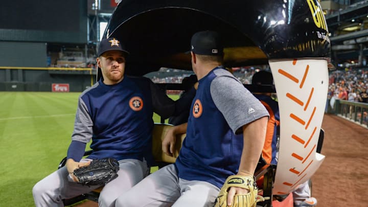 PHOENIX, AZ - MAY 06: Collin McHugh #31 and Brad Peacock #41 of the Houston Astros take a ride in the bullpen cart prior to the MLB game against the Arizona Diamondbacks at Chase Field on May 6, 2018 in Phoenix, Arizona. (Photo by Jennifer Stewart/Getty Images)
