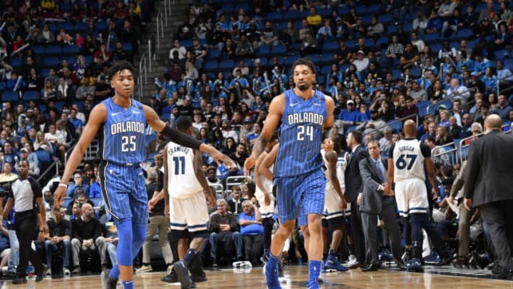 ORLANDO, FL - JANUARY 16: Wesley Iwundu #25 and Khem Birch #24 of the Orlando Magic react during game against the Minnesota Timberwolves on January 16, 2018 at Amway Center in Orlando, Florida. NOTE TO USER: User expressly acknowledges and agrees that, by downloading and or using this photograph, User is consenting to the terms and conditions of the Getty Images License Agreement. Mandatory Copyright Notice: Copyright 2018 NBAE (Photo by Fernando Medina/NBAE via Getty Images)