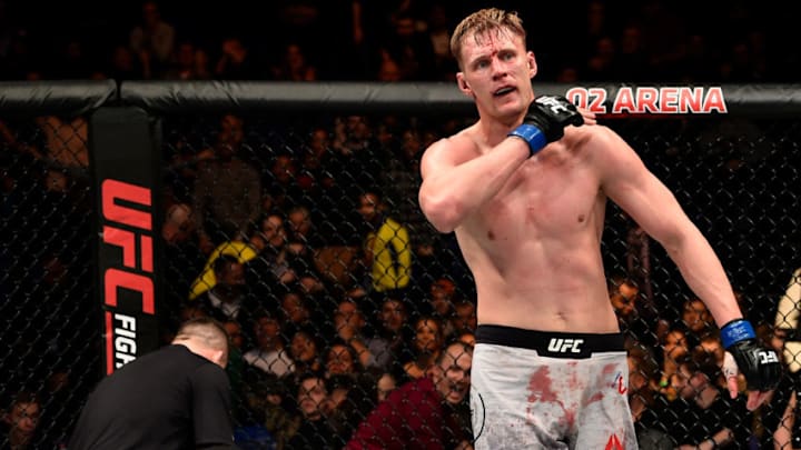 LONDON, ENGLAND - MARCH 17: (R-L) Alexander Volkov of Russia reacts after defeating Fabricio Werdum of Brazil in their heavyweight bout inside The O2 Arena on March 17, 2018 in London, England. (Photo by Brandon Magnus/Zuffa LLC/Zuffa LLC via Getty Images)