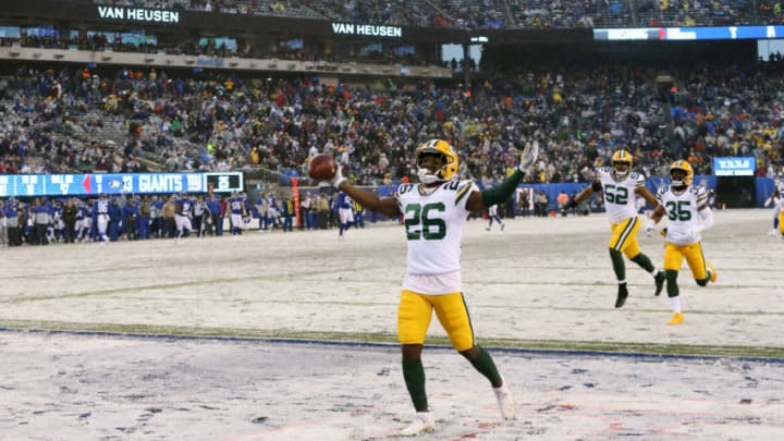 EAST RUTHERFORD, NEW JERSEY - DECEMBER 1: Safety Darnell Savage #27 of the Green Bay Packers has an Interception against the New York Giants in the second half in the snow at MetLife Stadium on December 1, 2019 in East Rutherford, New Jersey. (Photo by Al Pereira/Getty Images)