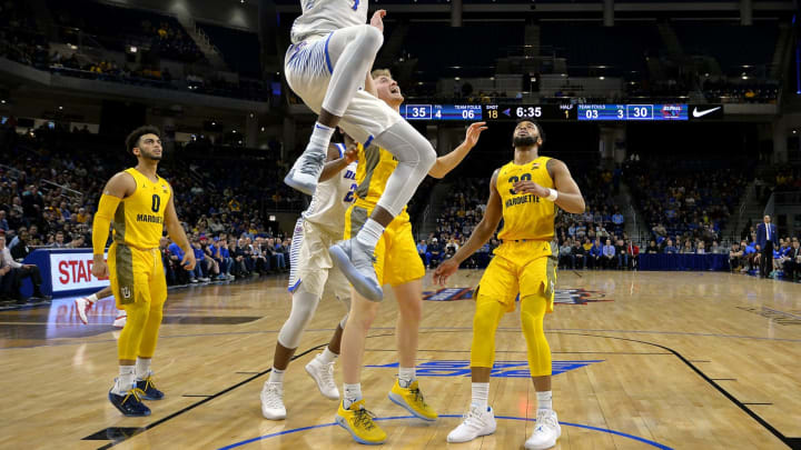 CHICAGO, ILLINOIS – FEBRUARY 12: Paul Reed #4 of the DePaul Blue Demons dunks against the Marquette Golden Eagles at Wintrust Arena on February 12, 2019 in Chicago, Illinois. (Photo by Quinn Harris/Getty Images)