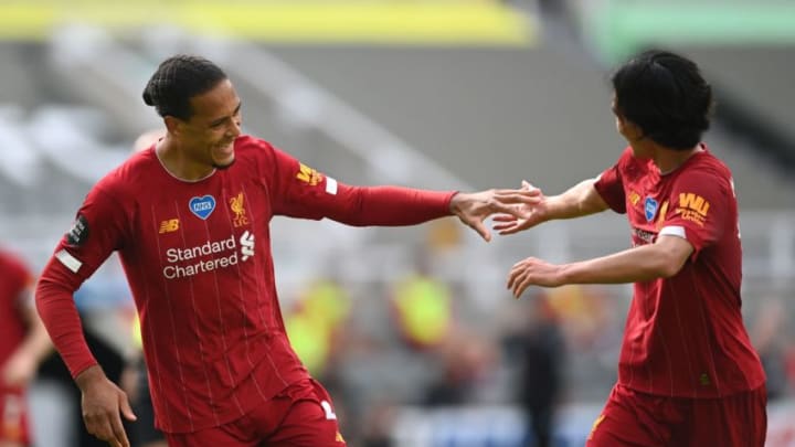 Liverpool, Virgil van Dijk, Takumi Minamino (Photo by LAURENCE GRIFFITHS/POOL/AFP via Getty Images)