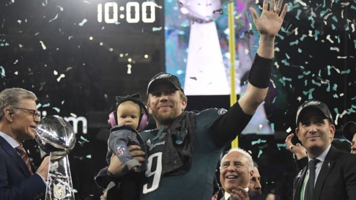 MINNEAPOLIS, MN - FEBRUARY 04: Nick Foles #9 of the Philadelphia Eagles celebrates with the Lombardi Trophy after the Eagles defeated the New England Patriots in Super Bowl LII at U.S. Bank Stadium on February 4, 2018 in Minneapolis, Minnesota. The Eagles defeated the Patriots 41-33. (Photo by Focus on Sport/Getty Images) *** Local Caption *** Nick Foles