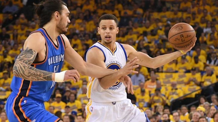May 18, 2016; Oakland, CA, USA; Golden State Warriors guard Stephen Curry (30) controls the basketball against Oklahoma City Thunder center Steven Adams (12) during the first quarter in game two of the Western conference finals of the NBA Playoffs at Oracle Arena. Mandatory Credit: Kyle Terada-USA TODAY Sports