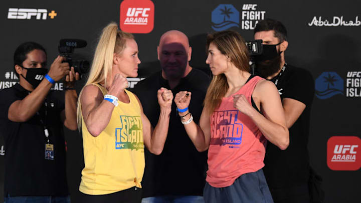 ABU DHABI, UNITED ARAB EMIRATES - OCTOBER 02: In this handout image provided by UFC, (L-R) Opponents Holly Holm and Irene Aldana of Mexico face off during the UFC Fight Night weigh-in on October 02, 2020 in Abu Dhabi, United Arab Emirates. (Photo by Josh Hedges/Zuffa LLC via Getty Images)
