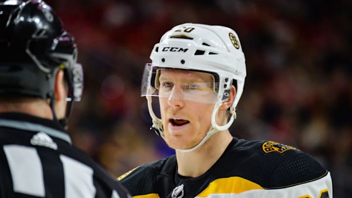 RALEIGH, NC - MARCH 13: Boston Bruins Center Riley Nash (20) talks with an official during a game between the Carolina Hurricanes and the Boston Bruins at the PNC Arena in Raleigh, NC on March 13, 2018. Boston defeated Carolina 6-4. (Photo by Greg Thompson/Icon Sportswire via Getty Images)