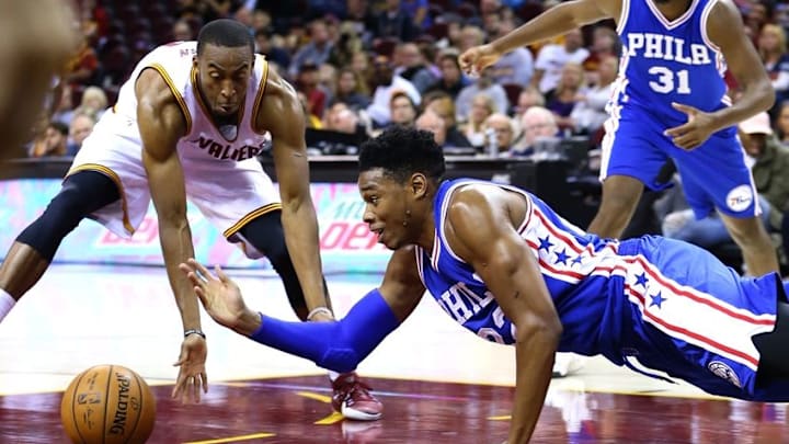Oct 8, 2016; Cleveland, OH, USA; Philadelphia 76ers forward Richaun Holmes (22) dives for the loose ball against Cleveland Cavaliers guard Markel Brown (10) in the second half at Quicken Loans Arena. The Cavaliers won 108-105. Mandatory Credit: Aaron Doster-USA TODAY Sports