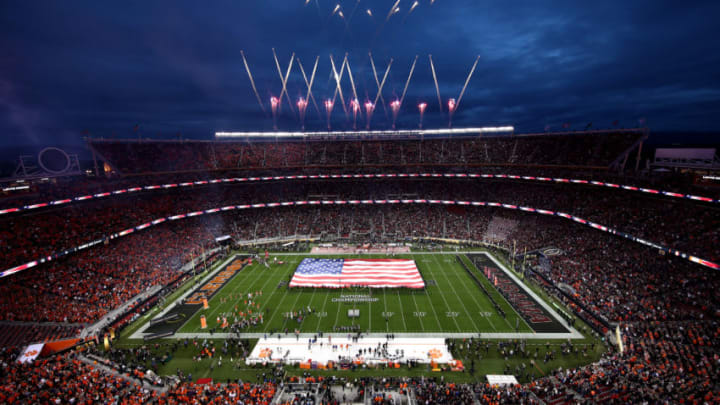 SANTA CLARA, CALIFORNIA - JANUARY 07: Singer Andy Grammer performs the national anthem as the American flag waves on the field prior to the College Football Playoff National Championship between the Clemson Tigers and the Alabama Crimson Tide at Levi's Stadium on January 07, 2019 in Santa Clara, California. (Photo by Ezra Shaw/Getty Images)