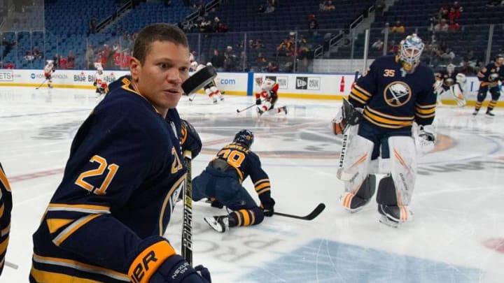 BUFFALO, NY - OCTOBER 30: Kyle Okposo #21 of the Buffalo Sabres before the game against the Calgary Flames at the KeyBank Center on October 30, 2018 in Buffalo, New York. (Photo by Kevin Hoffman/Getty Images)