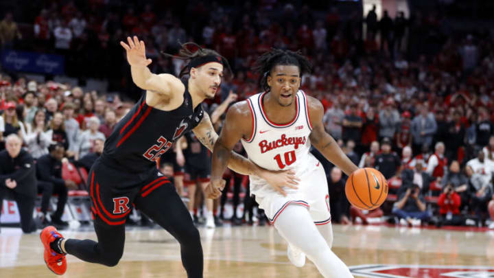 Dec 8, 2022; Columbus, Ohio, USA; Ohio State Buckeyes forward Brice Sensabaugh (10) dribbles the ball as Rutgers Scarlet Knights guard Caleb McConnell (22) defends during the second half at Value City Arena. Mandatory Credit: Joseph Maiorana-USA TODAY Sports