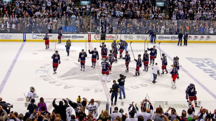 COLUMBUS, OH - APRIL 28: Players from the Columbus Blue Jackets salute their fans after being defeated 4-3 by the Pittsburgh Penguins in Game Six of the First Round of the 2014 NHL Stanley Cup Playoffs at Nationwide Arena on April 28, 2014 in Columbus, Ohio. (Photo by Kirk Irwin/Getty Images)
