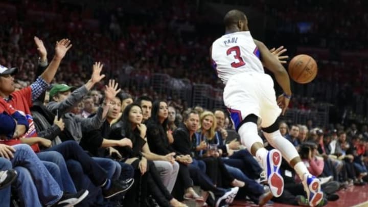 Apr 19, 2015; Los Angeles, CA, USA; Los Angeles Clippers guard Chris Paul (3) saves a ball from going out of bounds during the first quarter against the San Antonio Spurs in game one of the first round of the NBA Playoffs at Staples Center. Mandatory Credit: Richard Mackson-USA TODAY Sports