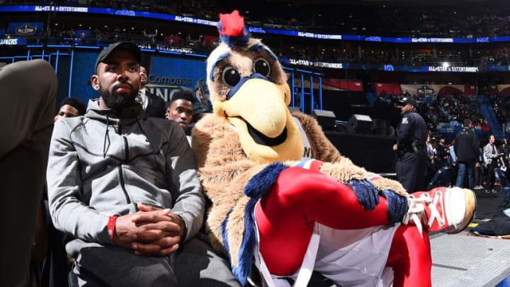 NEW ORLEANS, LA - FEBRUARY 17: Kyrie Irving #2 of the Cleveland Cavaliers and the mascot of the New Orleans Pelicans during the BBVA Compass Rising Stars Challenge as part of 2017 All-Star Weekend at the Smoothie King Center on February 17, 2017 in New Orleans, Louisiana. NOTE TO USER: User expressly acknowledges and agrees that, by downloading and/or using this photograph, user is consenting to the terms and conditions of the Getty Images License Agreement. Mandatory Copyright Notice: Copyright 2017 NBAE (Photo by Andrew D. Bernstein/NBAE via Getty Images)