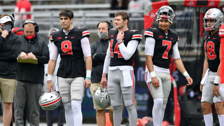 Quarterbacks Jack Miller III #9, Kyle McCord #14 and C.J. Stroud #7, all of the Ohio State Buckeyes  (Photo by Jamie Sabau/Getty Images)