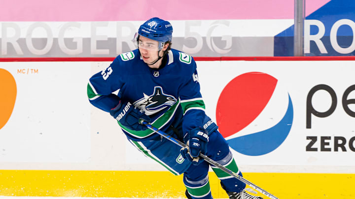 VANCOUVER, BC – MARCH 22: Quinn Hughes #43 of the Vancouver Canucks skates during NHL action against the Winnipeg Jets at Rogers Arena on March 22, 2021 in Vancouver, Canada. (Photo by Rich Lam/Getty Images)