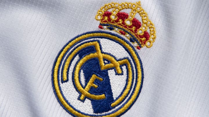 MANCHESTER, ENGLAND - JULY 19: The Real Madrid club crest on the first team home shirt on July 19, 2020 in Manchester, United Kingdom. (Photo by Visionhaus)