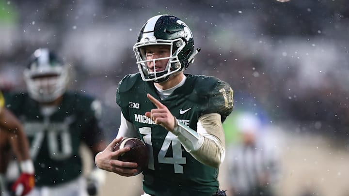 EAST LANSING, MI – NOVEMBER 18: Brian Lewerke #14 of the Michigan State Spartans runs for a first half touchdown while playing the Maryland Terrapins at Spartan Stadium on November 18, 2017 in East Lansing, Michigan. (Photo by Gregory Shamus/Getty Images)