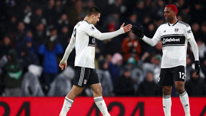 LONDON, ENGLAND - JANUARY 29: Aleksandar Mitrovic of Fulham celebrates after scoring his team's third goal with Ryan Babel of Fulham during the Premier League match between Fulham and Brighton & Hove Albion at Craven Cottage on January 29, 2019 in London, United Kingdom. (Photo by Clive Rose/Getty Images)