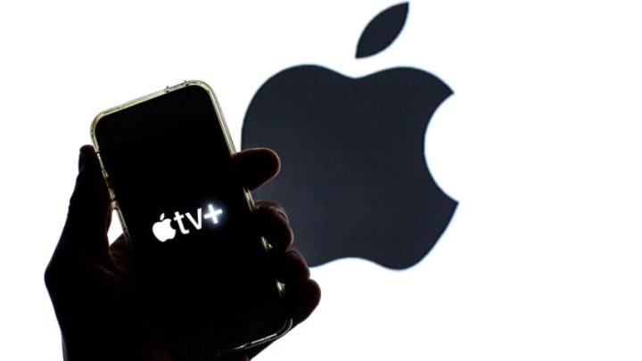 SPAIN - 2021/04/08: In this photo illustration the Apple TV+ app seen displayed on a smartphone screen with an Apple logo in the background. (Photo Illustration by Thiago Prudencio/SOPA Images/LightRocket via Getty Images)