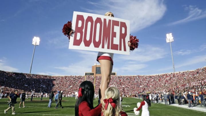 NORMAN, OK - NOVEMBER 25: Members of the Oklahoma Sooners spirit squad perform before the game against the West Virginia Mountaineers at Gaylord Family Oklahoma Memorial Stadium on November 25, 2017 in Norman, Oklahoma. Oklahoma defeated West Virginia 59-31. (Photo by Brett Deering/Getty Images) *** Local Caption ***