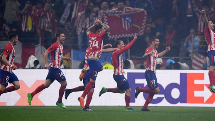 LYON, FRANCE - MAY 16: Antoine Griezmann of Atletico Madrid celebrates with team mates after scoring his team's second goal of the game during the UEFA Europa League Final between Olympique de Marseille and Club Atletico de Madrid at Stade de Lyon on May 16, 2018 in Lyon, France. (Photo by Laurence Griffiths/Getty Images)