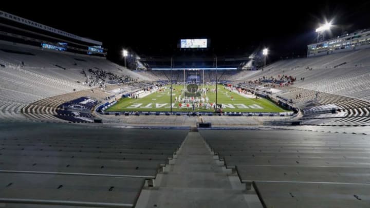 Ohio State Buckeyes players warn up in a nearly empty Beaver Stadium before the NCAA football game at Beaver Stadium in University Park, Pa. on Saturday, Oct. 31, 2020.Ohio State Faces Penn State In Happy Valley