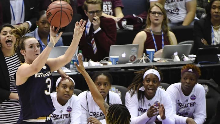 COLUMBUS, OH – APRIL 1: Marina Mabrey #3 of the Notre Dame Fighting Irish attempts a three point basket over Jazzmun Holmes #10 of the Mississippi State Bulldogs during the championship game of the 2018 NCAA Division I Women’s Basketball Final Four at Nationwide Arena in Columbus, Ohio. (Photo by Tim Nwachukwu/NCAA Photos via Getty Images)