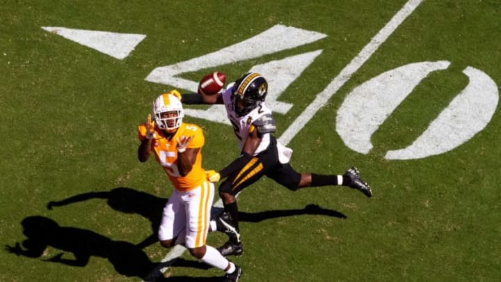 Tennessee wide receiver Josh Palmer (5) makes a catch over Missouri defensive back Ennis Rakestraw, Jr. (2) during a SEC conference football game between the Tennessee Volunteers and the Missouri Tigers held at Neyland Stadium in Knoxville, Tenn., on Saturday, October 3, 2020.Kns Ut Football Missouri Bp