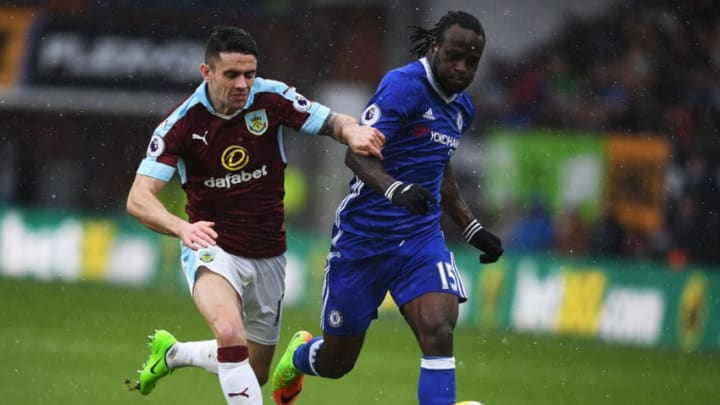BURNLEY, ENGLAND - FEBRUARY 12: Roby Brady of Burnley and Victor Moses of Chelsea in action during the Premier League match between Burnley and Chelsea at Turf Moor on February 12, 2017 in Burnley, England. (Photo by Mike Hewitt/Getty Images)