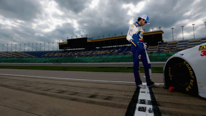 KANSAS CITY, KS - MAY 11: Chase Elliott, driver of the #9 NAPA Auto Parts Chevrolet, stands on the grid during qualifying for the Monster Energy NASCAR Cup Series KC Masterpiece 400 at Kansas Speedway on May 11, 2018 in Kansas City, Kansas. (Photo by Sean Gardner/Getty Images)