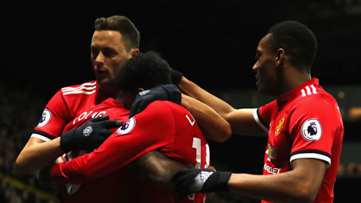 WATFORD, ENGLAND - NOVEMBER 28: Ashley Young of Manchester United celebrates scoring the first goal with Nemanja Matic, Jesse Lingard and Anthony Martial of Manchester United during the Premier League match between Watford and Manchester United at Vicarage Road on November 28, 2017 in Watford, England. (Photo by Richard Heathcote/Getty Images)