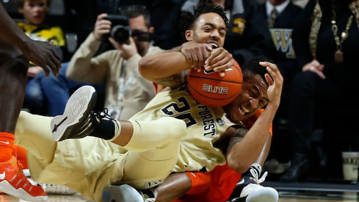 Dec 31, 2016; Winston-Salem, NC, USA; Wake Forest Demon Deacons forward John Collins (20) fights with Clemson Tigers guard Marcquise Reed (2) for the ball in the second half at Lawrence Joel Veterans Memorial Coliseum. Clemson defeated Wake 73-68. Mandatory Credit: Jeremy Brevard-USA TODAY Sports