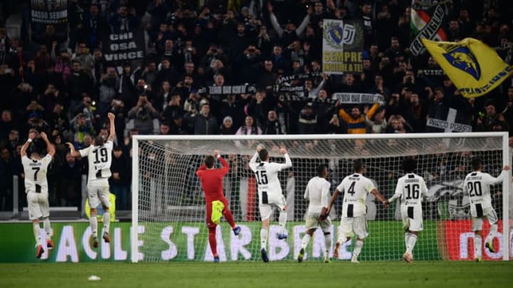 Juventus' players celebrate at the end of the Italian Serie A football match Juventus vs Cagliari at the Juventus Allianz stadium in Turin, on November 3, 2018. (Photo by MARCO BERTORELLO / AFP) (Photo credit should read MARCO BERTORELLO/AFP/Getty Images)