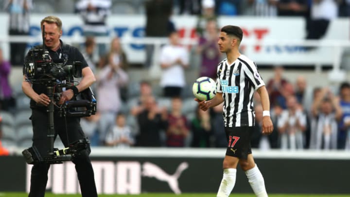 NEWCASTLE UPON TYNE, ENGLAND - APRIL 20: Ayoze Perez of Newcastle United leaves the pitch with the match ball following his hat-trick during the Premier League match between Newcastle United and Southampton FC at St. James Park on April 20, 2019 in Newcastle upon Tyne, United Kingdom. (Photo by Matthew Lewis/Getty Images)