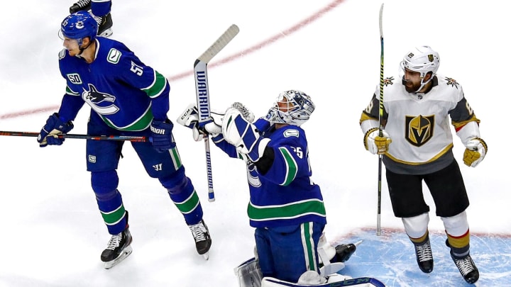 Jacob Markstrom #25 of the Vancouver Canucks reacts after allowing goal (Photo by Bruce Bennett/Getty Images)
