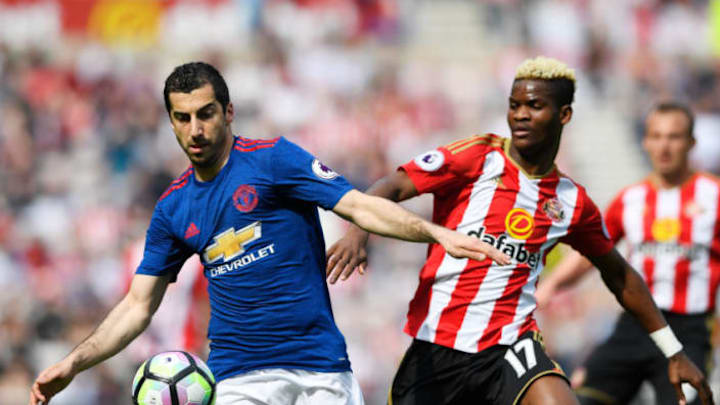 SUNDERLAND, ENGLAND – APRIL 09: Henrikh Mkhitaryan of Manchester United is closed down by Didier Ndong of Sunderland during the Premier League match between Sunderland and Manchester United at Stadium of Light on April 9, 2017 in Sunderland, England. (Photo by Stu Forster/Getty Images)