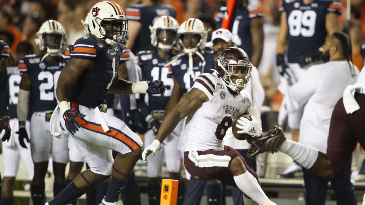 AUBURN, AL – SEPTEMBER 28: Running back Kylin Hill #8 of the Mississippi State Bulldogs runs the ball into the end zone for a touchdown in front of defensive end Big Kat Bryant #1 of the Auburn Tigers during the second quarter at Jordan-Hare Stadium on September 28, 2019 in Auburn, AL. (Photo by Michael Chang/Getty Images)