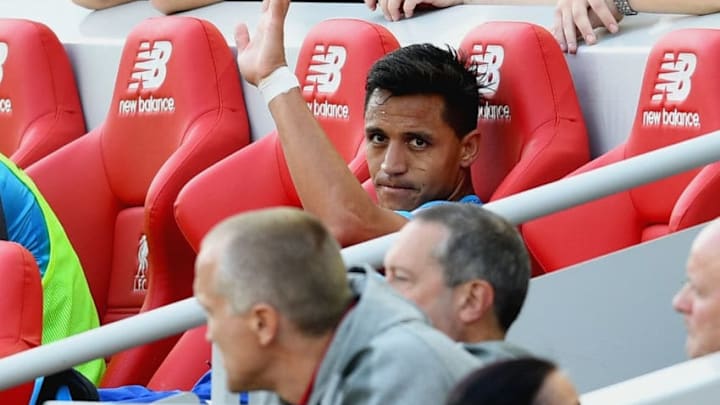 LIVERPOOL, ENGLAND - AUGUST 27: Alexis Sanchez of Arsenal waves after being subbed during the Premier League match between Liverpool and Arsenal at Anfield on August 27, 2017 in Liverpool, England. (Photo by Michael Regan/Getty Images)