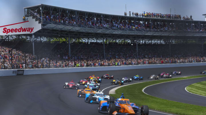 May 29, 2022; Indianapolis, Indiana, USA; Chip Ganassi Racing driver Scott Dixon (9) of New Zealand leads the field during the running of the 106th Indianapolis 500 at Indianapolis Motor Speedway. Mandatory Credit: Mike Dinovo-USA TODAY Sports